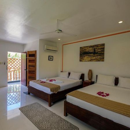 Evolution Dive And Beach Resort เกาะมาลาปัสกัว ภายนอก รูปภาพ