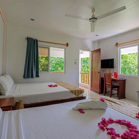Evolution Dive And Beach Resort เกาะมาลาปัสกัว ภายนอก รูปภาพ