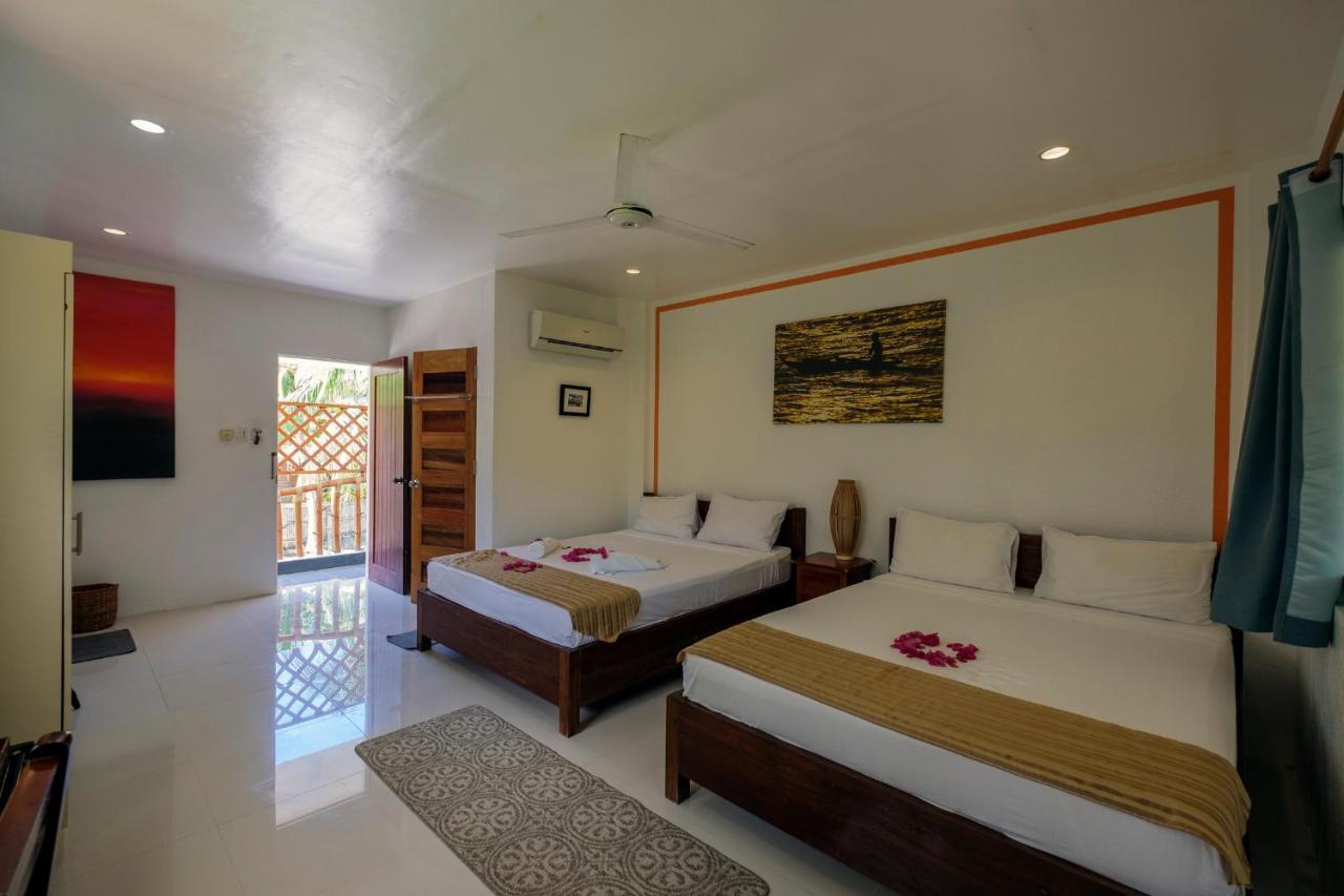 Evolution Dive And Beach Resort เกาะมาลาปัสกัว ภายนอก รูปภาพ