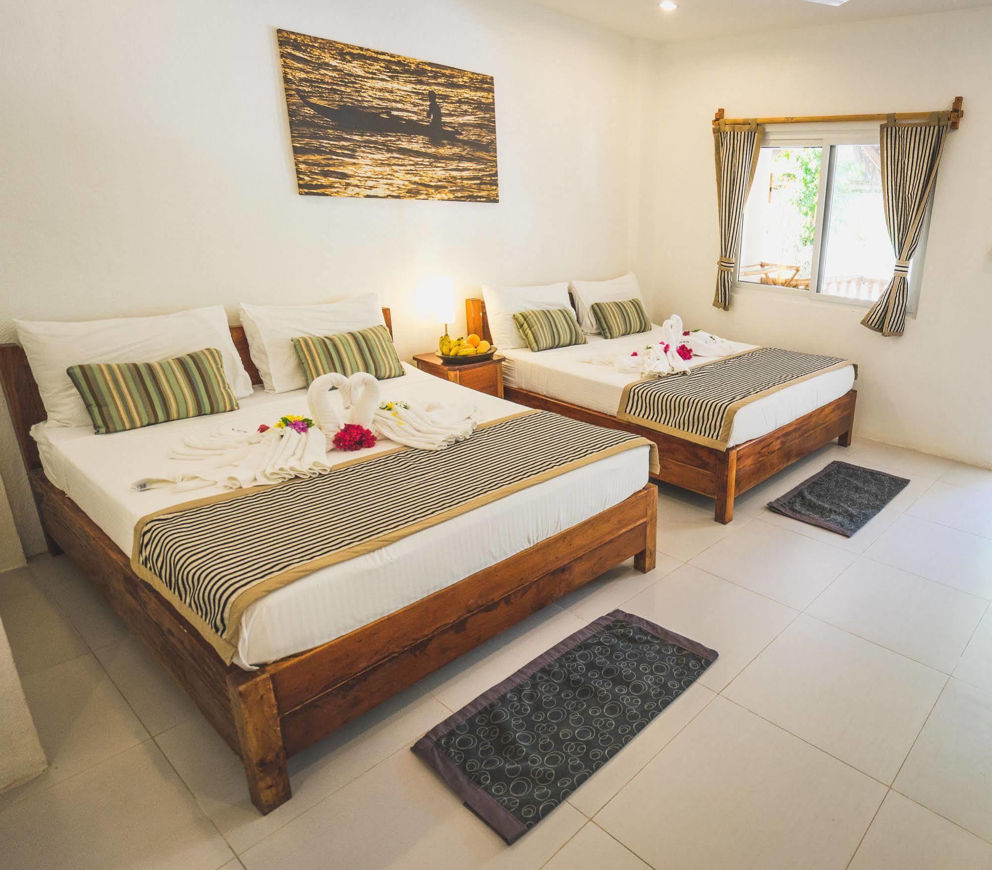 Evolution Dive And Beach Resort เกาะมาลาปัสกัว ภายนอก รูปภาพ