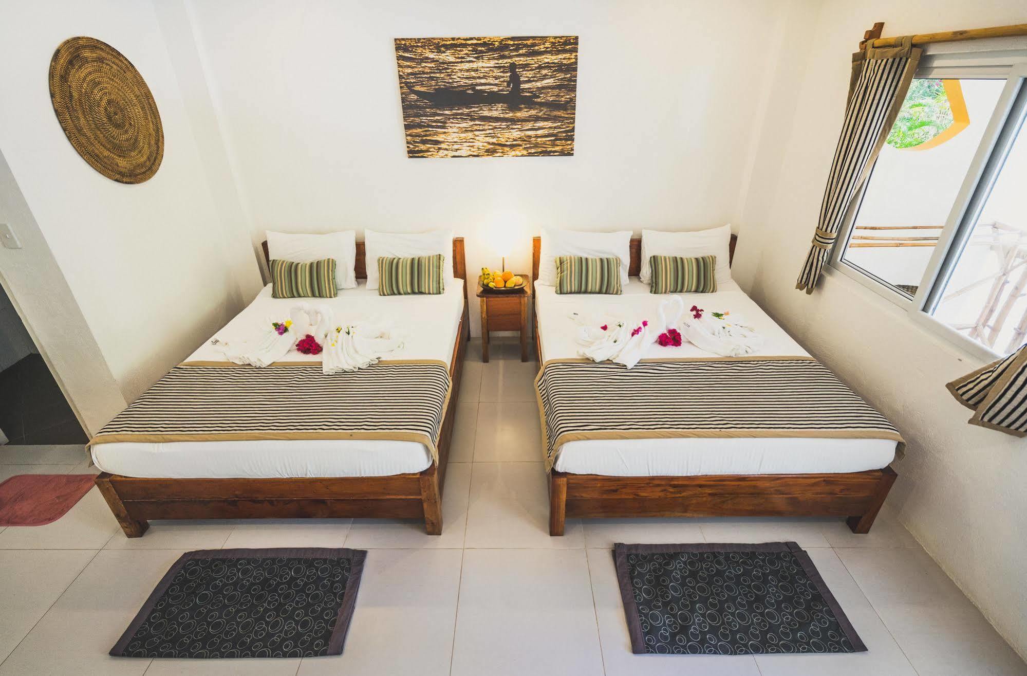 Evolution Dive And Beach Resort เกาะมาลาปัสกัว ภายนอก รูปภาพ